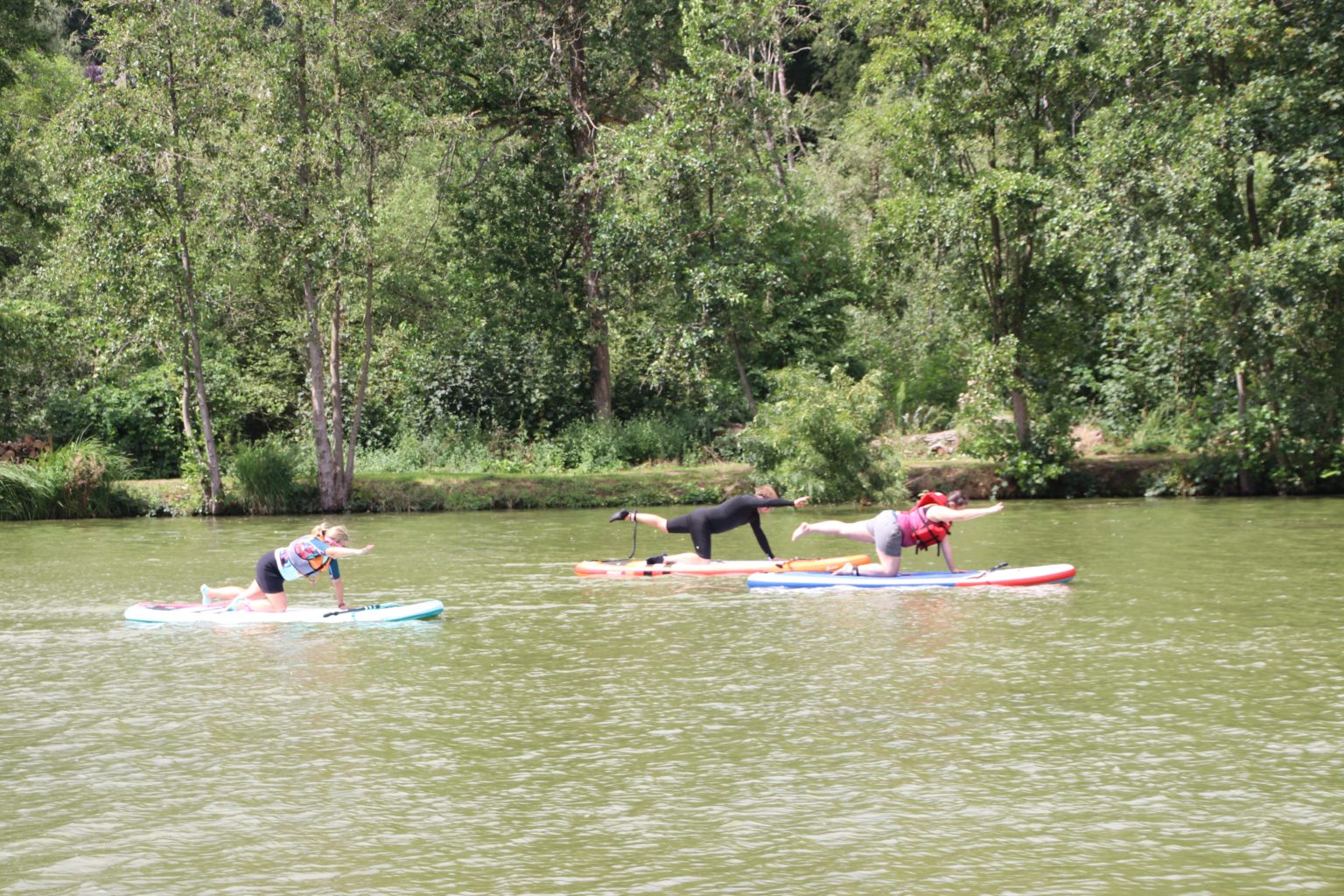 SUP yoga activity on the water